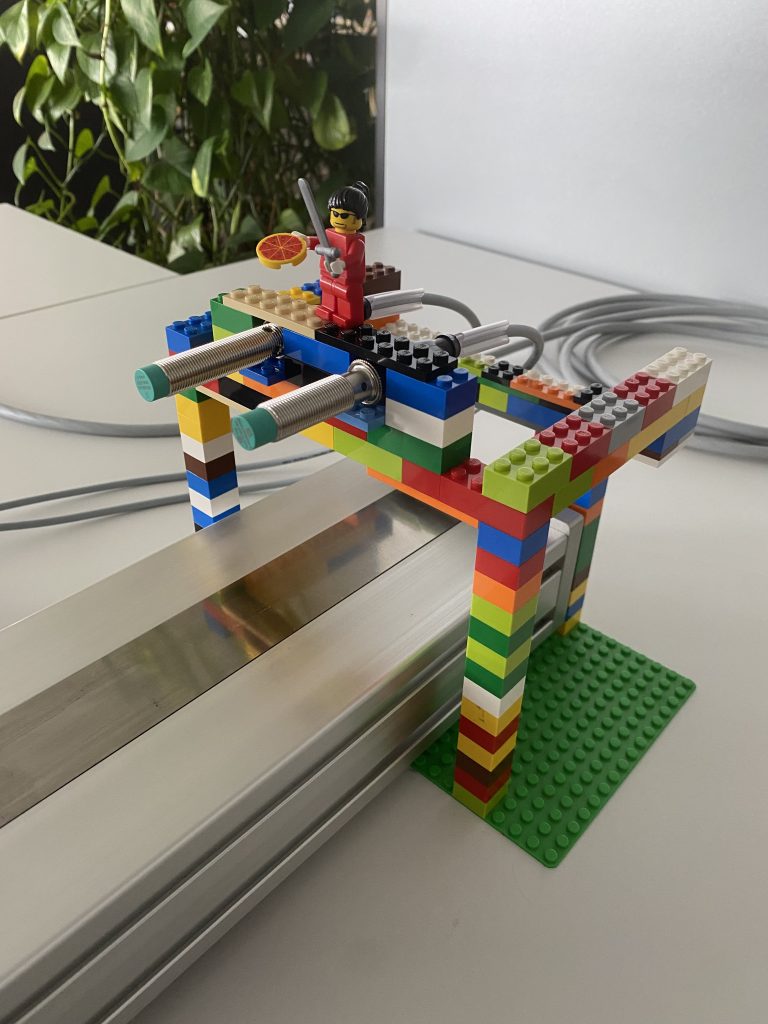 Another close-up of a bracket made of building blocks. The sensors are installed in it.