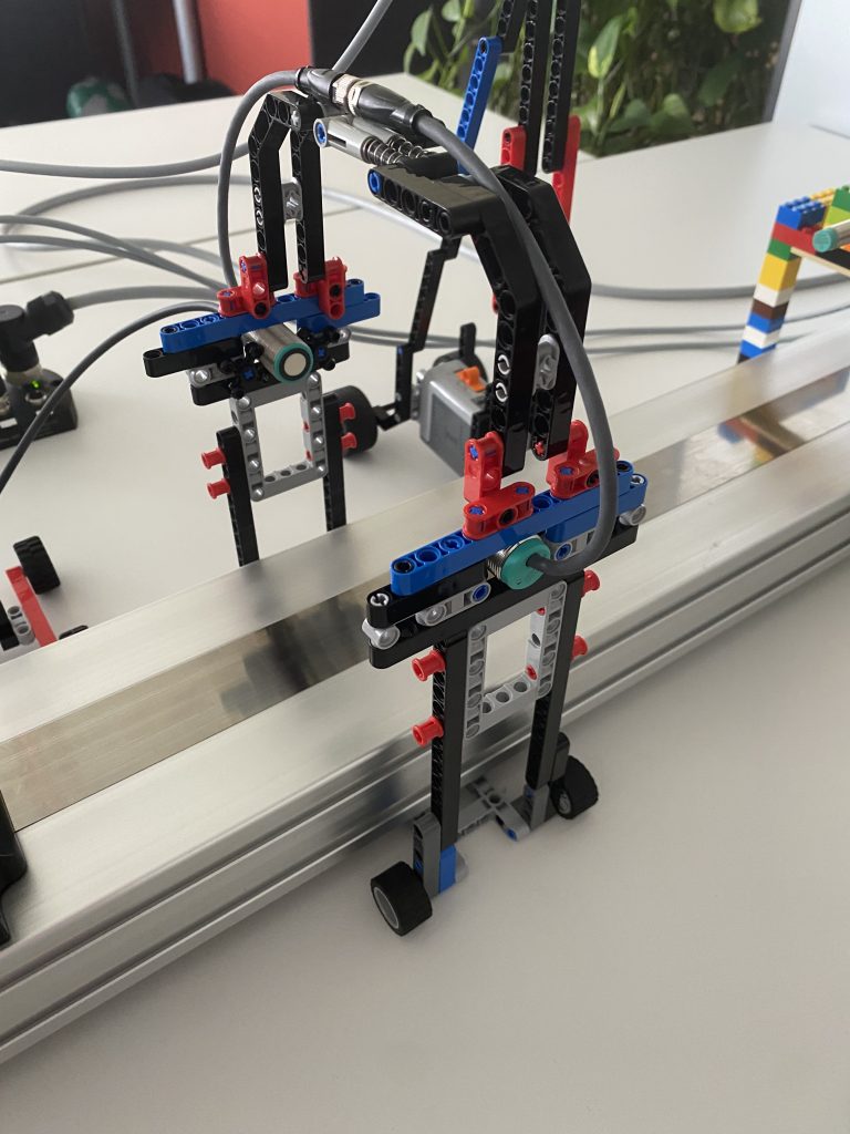 Close-up of a bracket made of building blocks. The sensors are installed in it.