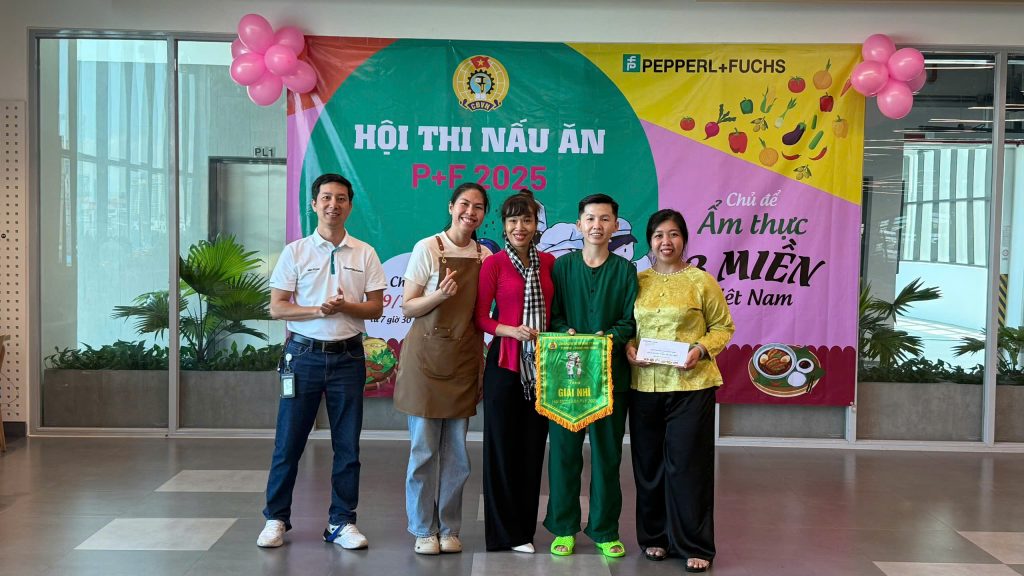 Cooking Competition at Pepperl+Fuchs Vietnam: Group photo of the second-place team